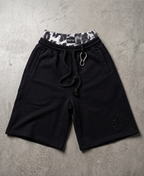 Shorts de leopardo medianoche con capas
