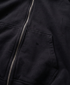 Sudadera con cremallera y sigilo de piel sintética