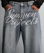 Script Embroidered Baggy Pants